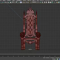 Ornate Dark Wood Armchair With Intricate Carved Details And Upholstered Seat