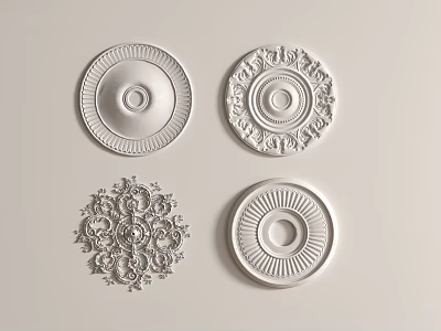 Four Plaster Carved Ceiling Decorations Featuring Intricate And Simple Ornate Designs 3d model