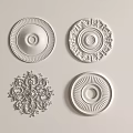Four Plaster Carved Ceiling Decorations Featuring Intricate And Simple Ornate Designs 3d model