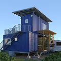 Blue Two Story Container House With Wooden Deck Outdoor Furniture And RV In Green Surroundings
