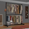 Double Layer Metal Clothes Hanger with Colorful Clothes and Storage Box in Bedroom