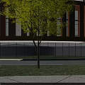Modern Industrial Factory Building With Green Roof Surrounding Trees and Parking Area