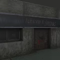 Detached Villa With Gray Walls Lehman's Drugs Sign Windows And Roll Up Door
