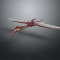 Red and White Flying Pterosaur Model with Extended Wings on Grey Background