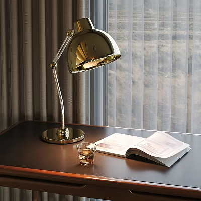 Brass desk lamp with open book and glass cup on table by window curtain 3d model