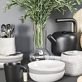 Stylish Kitchenware Set With Wooden Cutting Boards Black Kettles White Bowls Utensils And Green Plants
