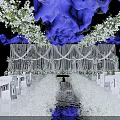 Banquet Hall with White Floral and Hanging Bubble Decorations White Drapery Backdrop and Lighting