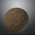 Homemade Artisanal Rustic Round Brown Cracked Bread Displayed on Simple Gray Background