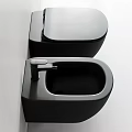 Sleek Black Wall Mounted Toilet With Matching Sink And Modern Faucet In Bathroom