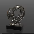 Silver Decorative Ornament Set with Intricate Scroll Patterns and Central Sphere on Black Square Base