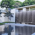 Modern Garden Landscape With Reflective Pool Waterfall Wall And Lush Trees 3d model