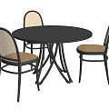 Round Dining Table with Woven Back Chairs Black Frame and Brown Seat Cushions