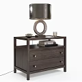 Dark Brown Wooden Two Drawer Dresser With Table Lamp Round Base Stacked Books And Decor