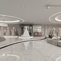 Elegant Modern Bridal Shop Interior With White Reception Counter Chandeliers Wedding Dress Mannequin And Staircase