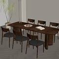 Dining Room Setup With Long Wooden Table Six Black Chairs And Potted Plant