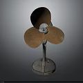 Vintage Electric Fan with Three Rustic Blades and Metal Base Retro Design