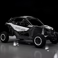 Can Am UTV Black And White Open Cabin With Large Off Road Tires
