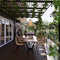 Lush Garden Landscape With Pergola Vines Wooden Deck And Outdoor Dining Setup