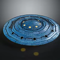 Circular Blue Chandelier with Yellow Lights and Holes in Modern Tech Inspired Design