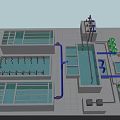 Aerial View of Water Treatment Facility with Blue Pipes White Tanks and Green Equipment