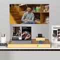 Modern Display Shelf with Books Decorations Laptop and Stationery on Desk
