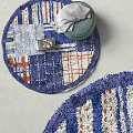 Colorful Patchwork Round Rug with Blue Red White Patterns Soft Textured Design