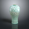 Carved Celadon Vase With Intricate Patterns And Glossy Decorative Ceramic Artwork