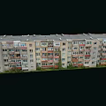 Multi Storey Residential Building Exterior With Light Colored Facade And Balconies