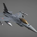 Military Fighter Jet With Gray Camouflage Paint Golden Nose Cone Mounted Missiles And Wing Markings