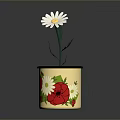 Yellow Flower Pot With Floral Patterns Holding White Daisy Plant With Green Stem And Leaves