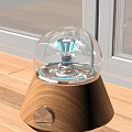 Modern Decorative Lamp With Transparent Glass Dome Blue Lighting And Wooden Base On Window Sill