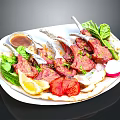 Grilled Lamb Chops With Fresh Lettuce Lemon Slice Tomato And Sauce On Plate