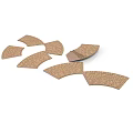 Multiple Curved Cork Pads With Textured Surface Arranged On White Background