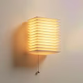Modern Layered Wall Lamp With Soft Lighting And Hanging Chain Design