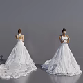 Women In White Wedding Dresses Back And Front View Holding Phone On Simple Gray Background
