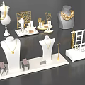 Elegant Jewelry Display Stands With Mannequins Necklaces Earrings And Golden Accessories