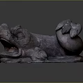 Reddish Brown Stone Sculpture With Curved Body And Detailed Textures On Dark Background