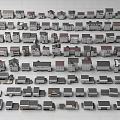 Various Styles And Sizes Of House Models With Gray Brown Roofs And White Gray Walls