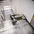 Modern Escalator in Lobby with Marble Floor Metal Handrails and Lighting Design