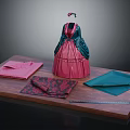 Vintage Pink And Green Dress With Floral Patterned Fabrics On Wooden Platform