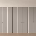 Grey Wardrobe Doors Arranged Side by Side Against White Wall With Wooden Floor