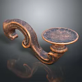 Copper Candlestick With Curved Handle And Round Tray On Dark Reflective Surface