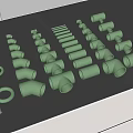Different Green Pipe Fittings Including Elbows And Straight Tubes Arranged On Black Surface