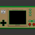 Classic Game Boy Handheld Electronic Device Displaying The Legend of Zelda With Green Gold Design