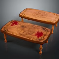 Wooden Coffee Tables With Intricate Carved Patterns And Red Accents On Carved Legs