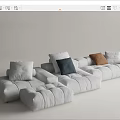 Modern White Modular Sectional Sofa With Brown Blue And White Pillows