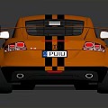 Orange Sports Car With Black Stripes Rear View Sporty Spoiler And Alloy Wheels