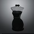 Black Strapless Evening Dress On Transparent Mannequin With Bow And Ruffled Hem