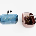 Modern Transparent Blue And Copper Washbasins With Gold Star Decorations And Black Faucets