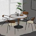 Modern Round Dining Table Set With Four Wooden Chairs Metal Base And Plant